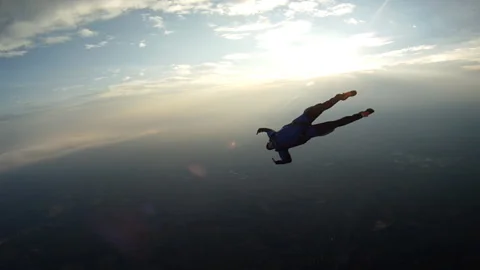 Skydiving student doing stunts in free fall. Stock Footage