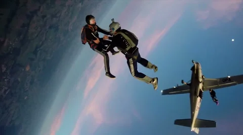 Skydiving sunset team work Stock Footage 54581551