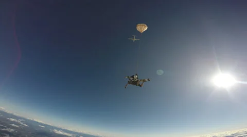 Skydiving tandem jump friends Stock Footage 68924926