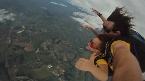 Skydiving tandem jump from the plane Stock Footage 59564261