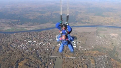 Skydiving tandem opening parachute Stock Footage 105425254