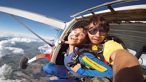 Skydiving tandem selfie Stock Footage 75877383