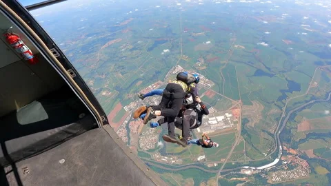 Skydiving team exit Stock Footage 149082652