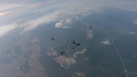 Skydiving team work above above the port of Santos Stock Footage 245370089