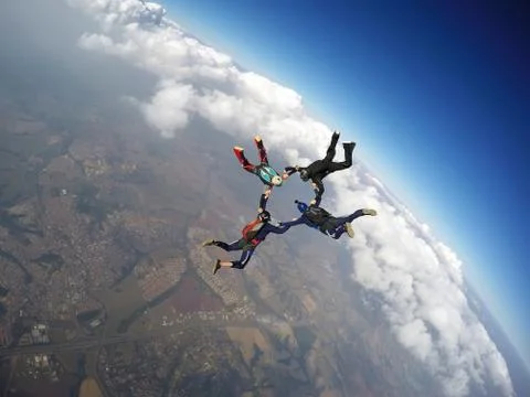 Skydiving team work star formation Foto stock