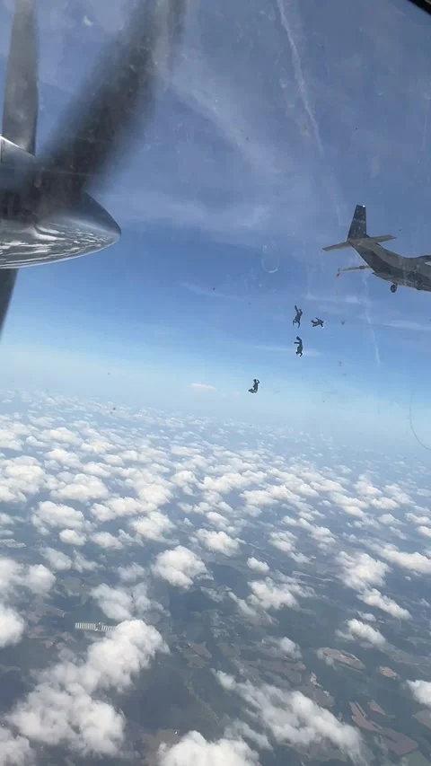 Skydvers exit vertical video Stock Footage 313360214