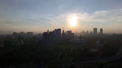 Skyfire Dawn: Aerial 4K Drone View of Mexico City Stock Footage 310260437