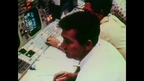 Skylab astronauts communicate with flight controllers in the Mission Control Stock Footage 92628594