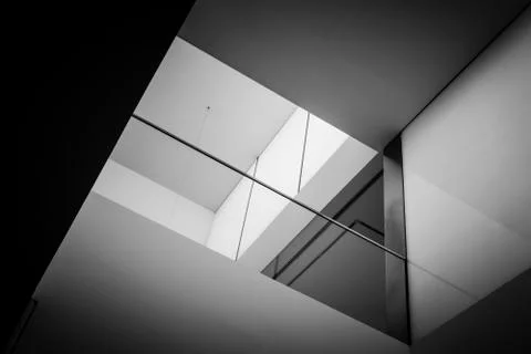 Skylight or light well in interior building, natural light falling from the top. Stock Photos