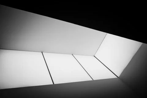Skylight or light well in interior building, natural light falling from the top. Stock Photos