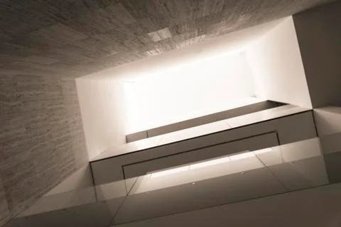 Skylight or light well in interior building, natural light falling from the top. Stock Photos