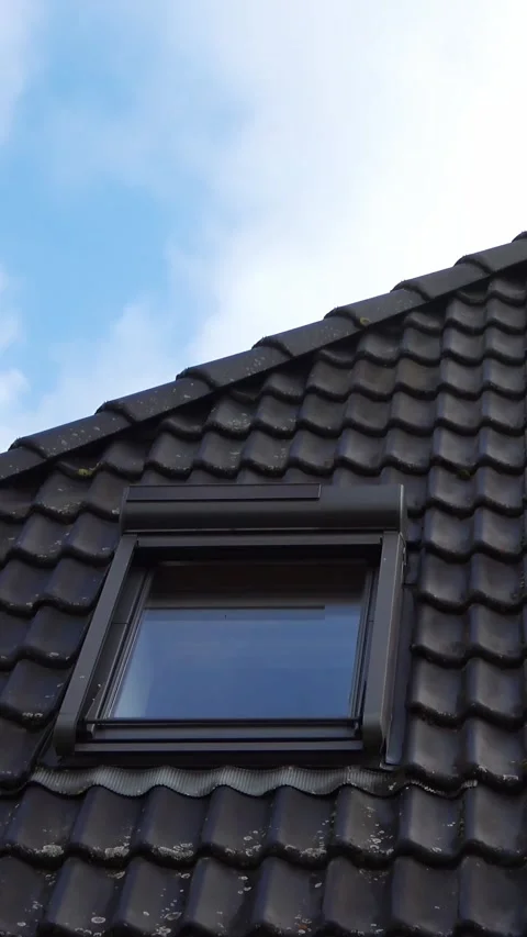 Skylight roof window with moving clouds reflection Stock Footage 327492766