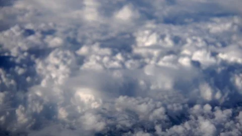 Skyline aerial view above clouds from air plane Stock Footage 89363399