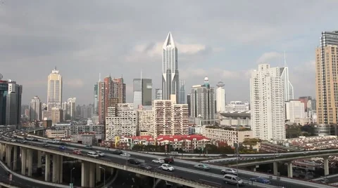 Skyline and busy traffic on elevated expressway in modern city ,shanghai. Video stock 48174579