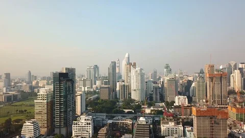 Skyline and train passing in big city Bangkok Stock-Footage 85940265