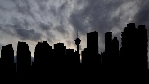 Skyline of Calgary in Canada, Time Lapse at Sunrise with Fast Clouds Stock Footage 277839978