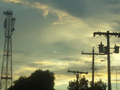 Skyline Cityscape at Evening - Dramatic Cloudy Sky Stock Photos