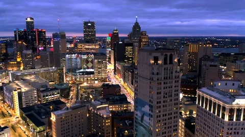 Skyline of Detroit Michigan at sunset aerial Stock Footage