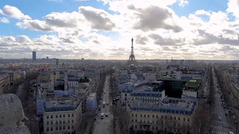 Skyline with Eiffel Tower and bright sky in Paris, France at sunset Stock Footage 146071213