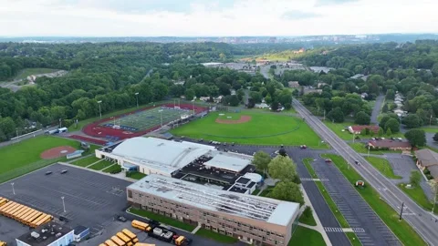 As the Skyline Erupts Beyond the Tree Line - Syracuse, NY Stock Footage 336485590