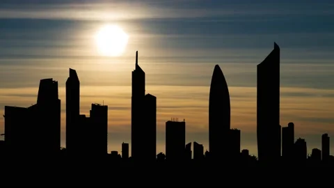 Skyline of Kuwait Downtown, Time Lapse at Sunset with Colorful Clouds Stock Footage 221775206