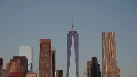 Skyline Landmark Tower, Architectural Marvel Set Against Cloudless Blue Sky With Stock Footage 323771204