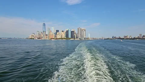 Skyline of Manhattan View from the Ferry, A panoramic view of Manhattan's Stock Footage 297272883