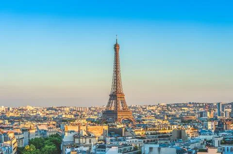 Skyline of paris with eiffel tower at dusk Stock Photos