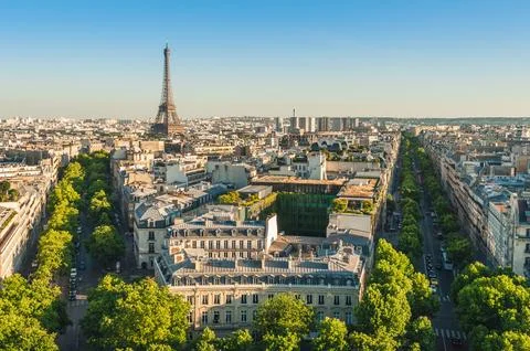 Skyline of paris with eiffel tower at dusk Stock Photos