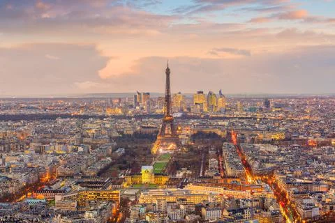 Skyline of Paris with Eiffel Tower at sunset in France Stock Photos