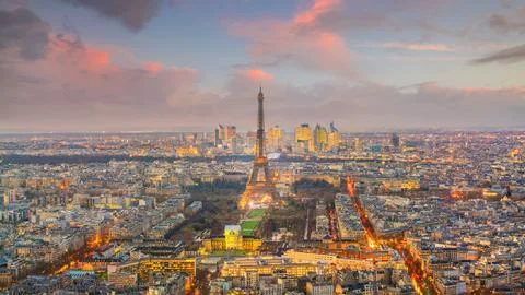Skyline of Paris with Eiffel Tower at sunset in France Stock Photos