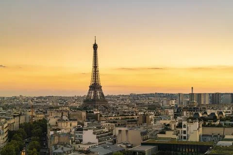 Skyline of Paris by sunset with Eiffel Tower Stock Photos