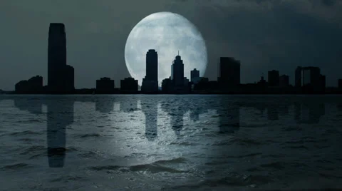 Skyline silhouette. moon. full moon. time lapse. water reflection. skyscrapers Stock Footage 33822094