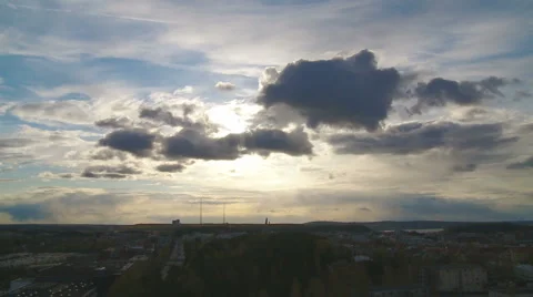 Skyline of a sun setting over city Stock Footage