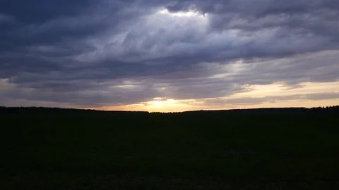 Skyline, sunset, dark clouds Stock Footage 75431163