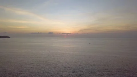 Skyline sunset time on the ocean aerial footage Stock Footage 100653685
