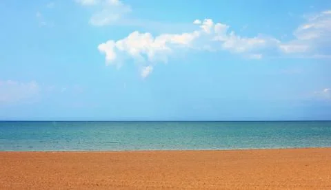 Skyline with three elements blue sky clear oceans and sandy beach 스톡 사진