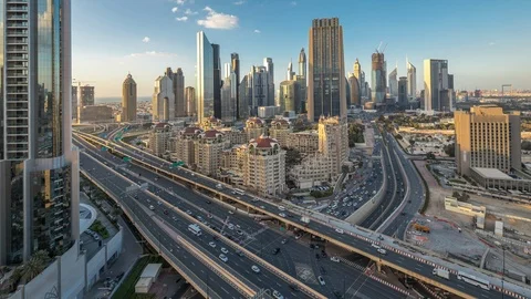 Skyline view of the buildings of Sheikh Zayed Road and DIFC day to night Stock Footage 110838784