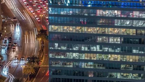 Skyline view of intersection traffic on Al Saada street near DIFC night in Du Stock Photos