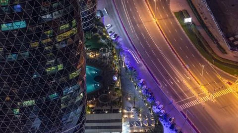 Skyline view of intersection traffic on Al Saada street near DIFC night tim.. Stock Photos