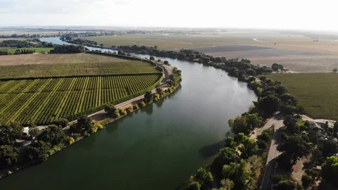 Skyline view of the Sacramento River winding through agricultural landscape Stock Footage