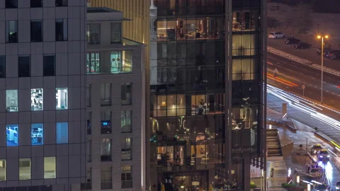 Skyline view of traffic on Al Saada street near DIFC district night timelapse in Stock Footage 210762039