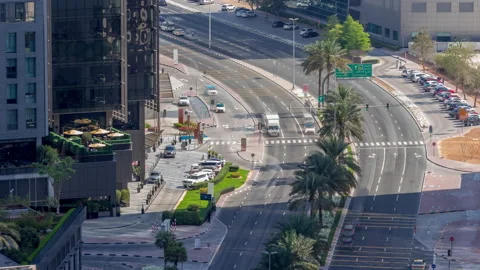 Skyline view of traffic on Al Saada street near DIFC district timelapse in Dubai Stock Footage 210776516