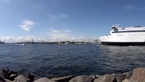 Skyline warnemünde - passenger ferry 'Berlin' reaches the harbour Rostock Stock Footage 136955043