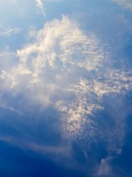 Skylines Embrace the Dance of Clouds Stock Photos