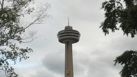 Skylon Tower by Niagara Falls Through Trees Stock Footage 91734998