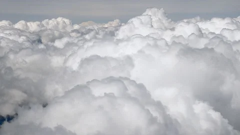 Skyscape with cloud from the plane window midair. Spectacular view from the 動画素材 126360256
