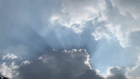 Skyscape time lapse of clouds with crepuscular rays 스톡 동영상 145997906