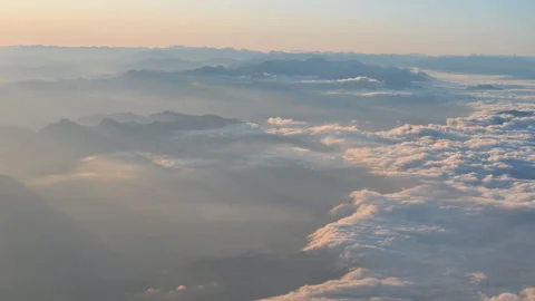 Skyscape viewed from aircraft in the rays of sunset Stock Footage 294687493