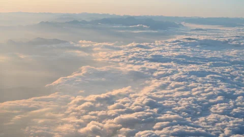 Skyscape viewed from aircraft in the rays of sunset Stock Footage 294687502